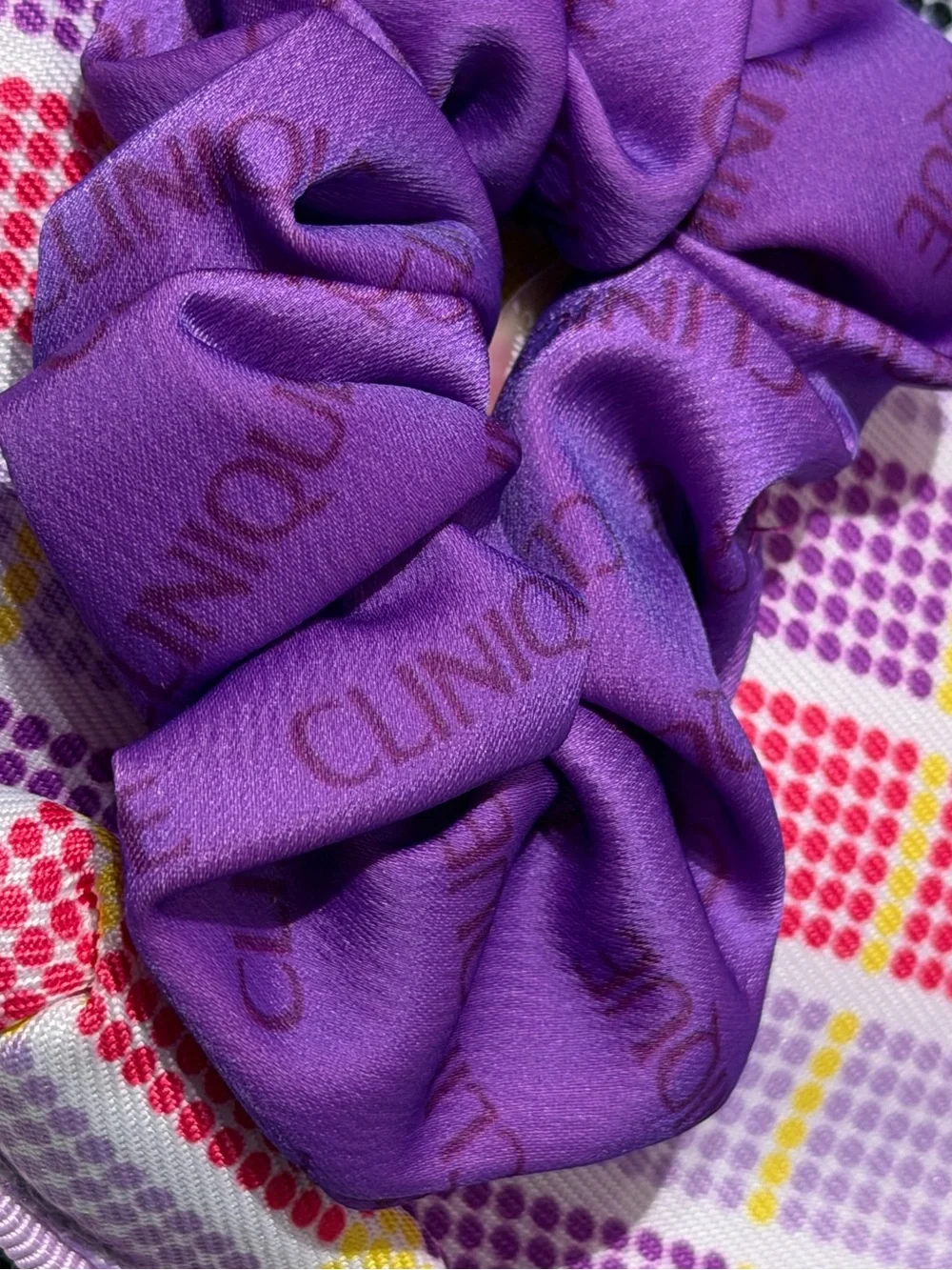 Clinique Pink Purple Yellow Patterned Cosmetic Bag with Purple Scrunchies